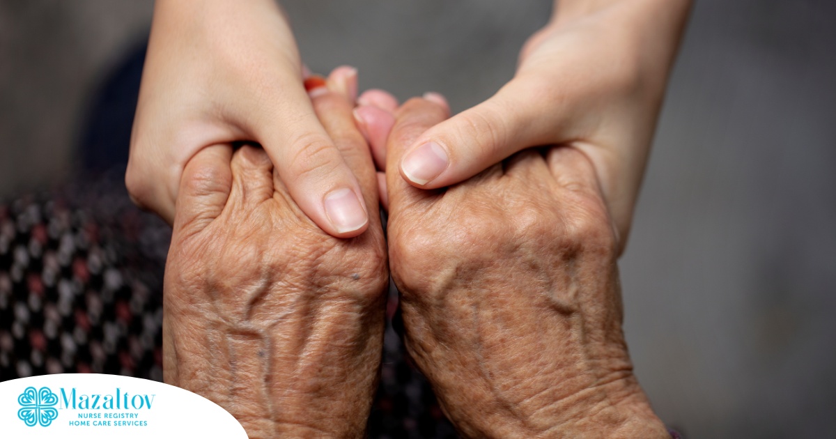 Younger hands hold older ones, representing the care and compassion of caregiving and how caregivers can help, even in ways like implementing stroke prevention strategies.